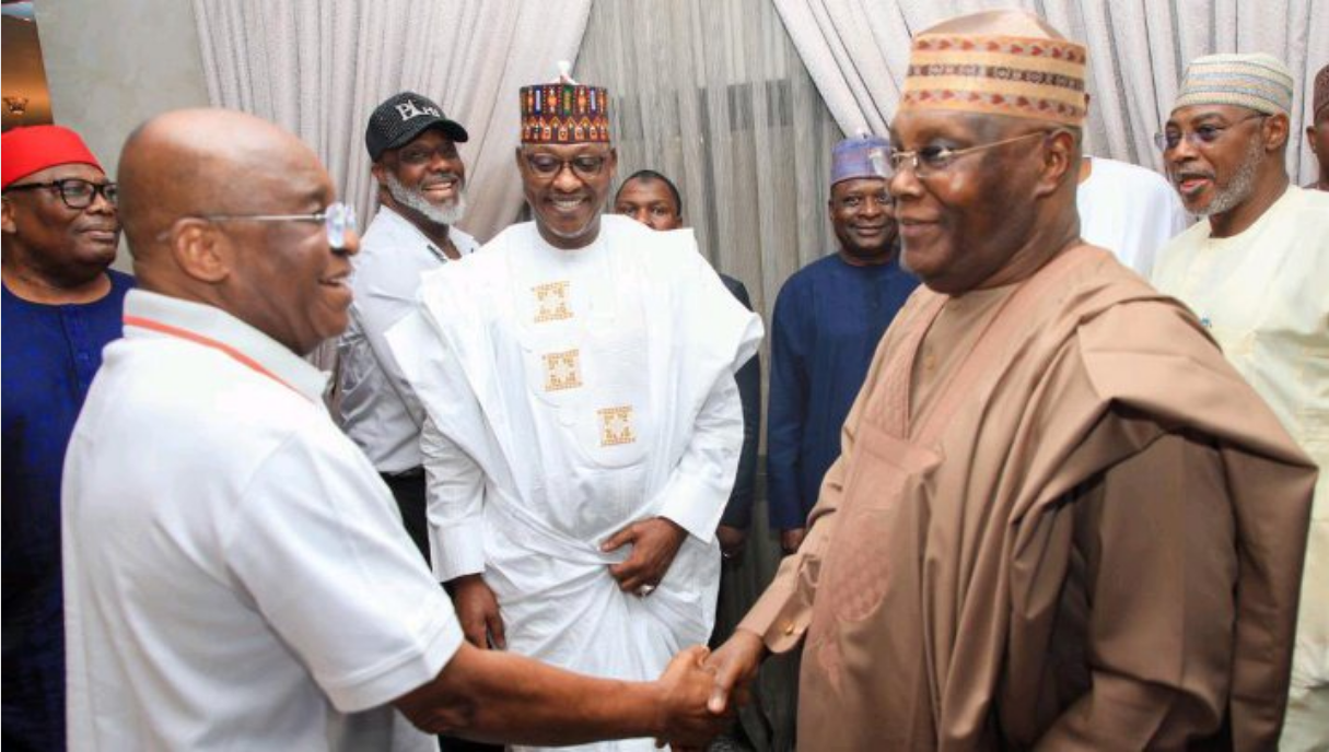 Atiku Abubakar shakes hands with ADC Chairman David Mark during a courtesy visit